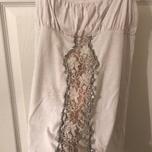 White simple cami with lace center -Offers welcome